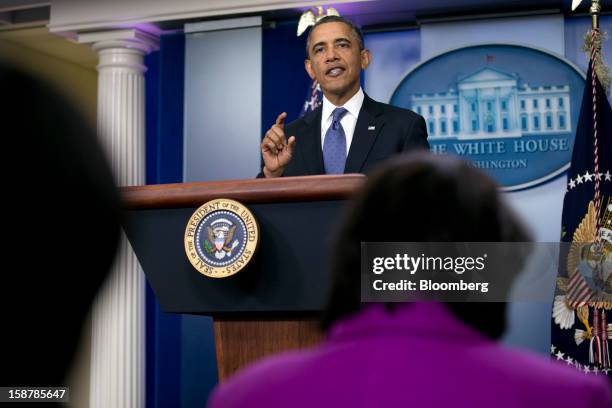 President Barack Obama speaks in the Brady Press Briefing Room at the White House in Washington, D.C., U.S., on Friday, Dec. 28, 2012. Obama is...