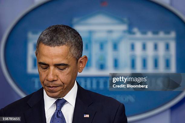 President Barack Obama speaks in the Brady Press Briefing Room at the White House in Washington, D.C., U.S., on Friday, Dec. 28, 2012. Obama is...