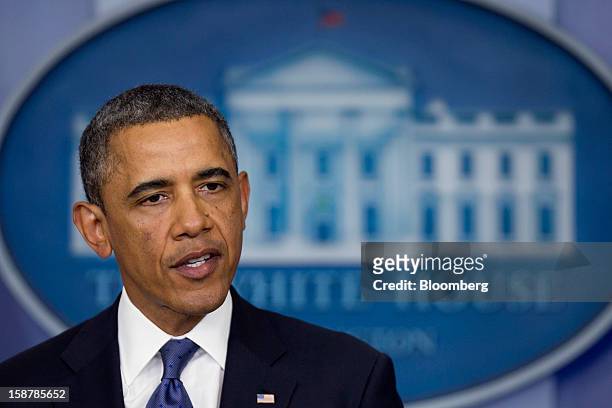 President Barack Obama speaks in the Brady Press Briefing Room at the White House in Washington, D.C., U.S., on Friday, Dec. 28, 2012. Obama is...