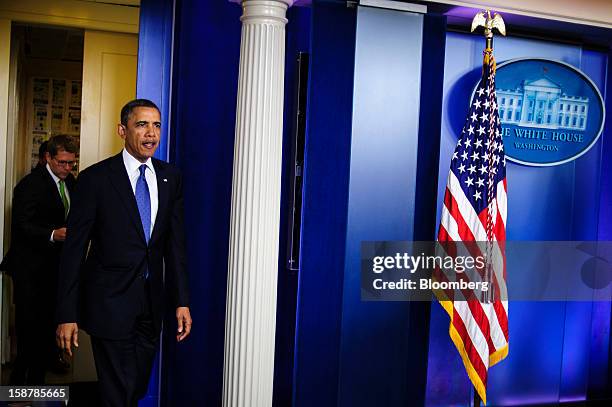 President Barack Obama arrives to speak in the Brady Press Briefing Room at the White House in Washington, D.C., U.S., on Friday, Dec. 28, 2012....