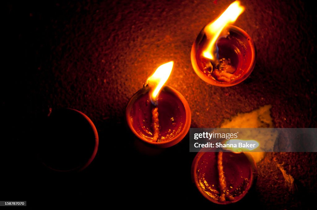 Burning butter lamps from above