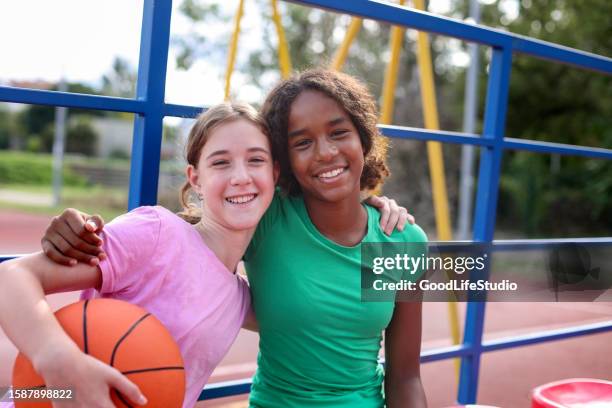 best friends - elementary basketball stock pictures, royalty-free photos & images