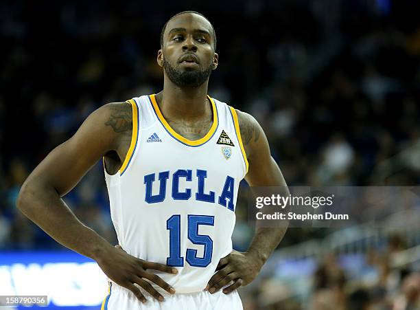 Shabazz Muhammad of the UCLA Bruins stands on the court in the game with the Missouri Tigers at Pauley Pavilion on December 28, 2012 in Los Angeles,...