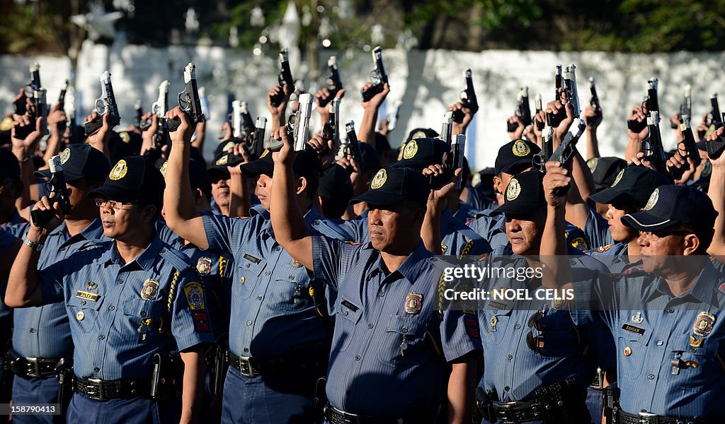 PHILIPPINES-NEW YEAR-POLICE-GUNS