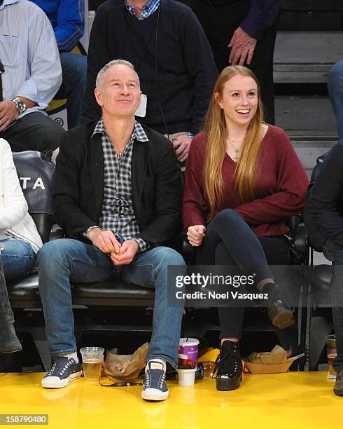 John McEnroe and his daughter Anna McEnroe attend a basketball game between the Portland Trailblazers and the Los Angeles Lakers at Staples Center on...