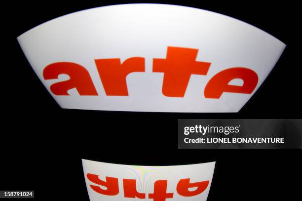 The French television channel "Arte" logo, is displayed on a tablet screen, on December 29, 2012 in Paris. AFP PHOTO / LIONEL BONAVENTURE