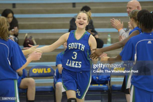 December 28: South Lakes G Gabrielle Schultz is all smiles during player introductions prior to IAABO Holiday Classic final action against West...