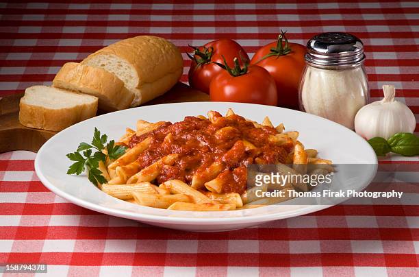 mostaccioli with sauce -  firak stock pictures, royalty-free photos & images