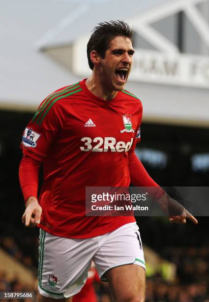 Danny Graham of Swansea City celebrates scoring during the Barclays Premier League match between Fulham and Swansea City at Craven Cottage on...