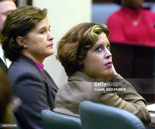 Noelle Bush right, niece of US President George W. Bush and daughter of Florida Governor Jeb Bush, looks around the courtroom as she sits with her...
