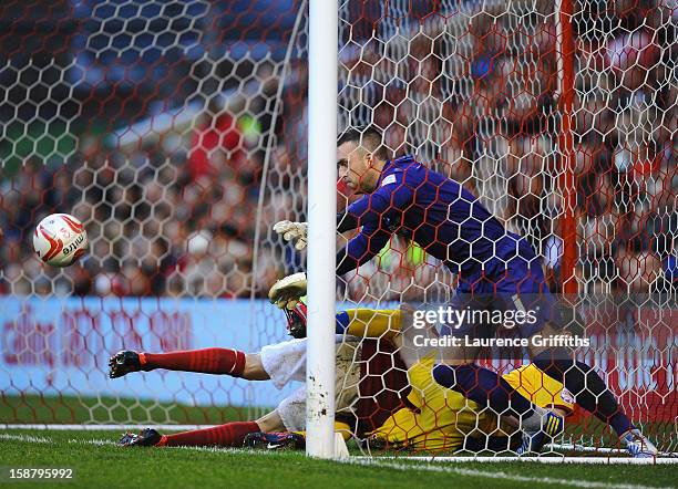 Lee Camp of Nottingham Forest saves on the line from Peter Ramage of Crystal Palace during the npower Championship match between Nottingham Forest...