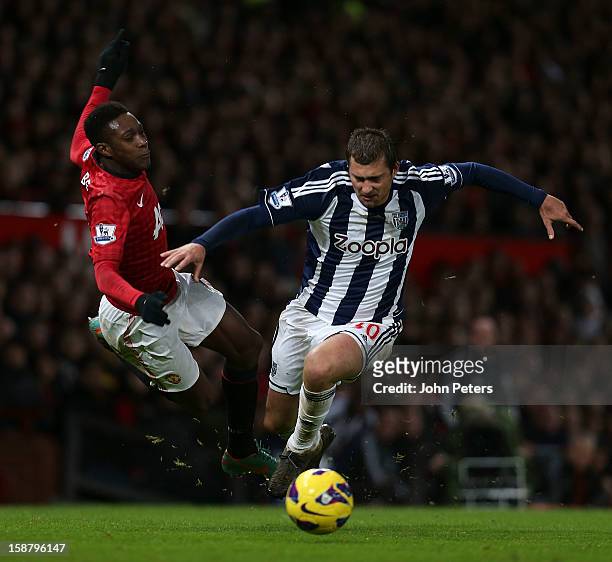 Danny Welbeck of Manchester United in action with Gabriel Tamas of West Bromwich Albion during the Barclays Premier League match between Manchester...