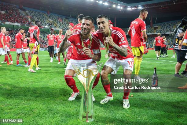 Nicolas Otamendi of SL Benfica and Angel Di Maria of SL Benfica with the Portuguese Supertaca after the match between SL Benfica and FC Porto for the...