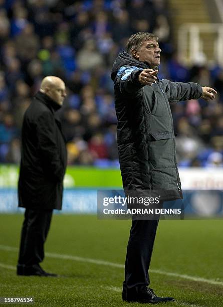 West Ham United's English manager Sam Allardyce gestures during the English Premier League football match between Reading and West Ham United at at...