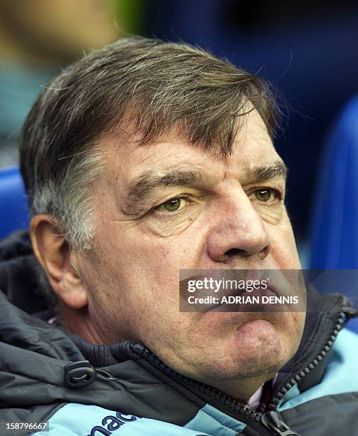 West Ham United's English manager Sam Allardyce looks on ahead of the English Premier League football match between Reading and West Ham United at at...