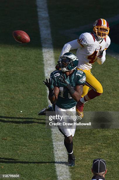 Jeremy Maclin of the Philadelphia Eagles catches a pass for a touchdown in front of Madieu Williams of the Washington Redskins at Lincoln Financial...