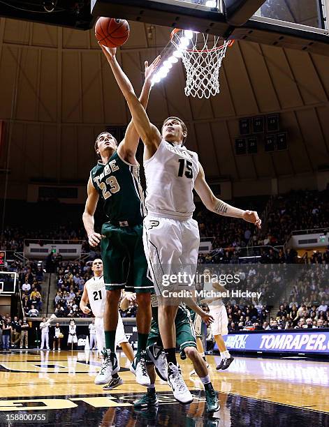 Donnie Hale of the Purdue Boilermakers shoots the ball as Kyle Gaillard of the William & Mary Tribe defends at Mackey Arena on December 29, 2012 in...