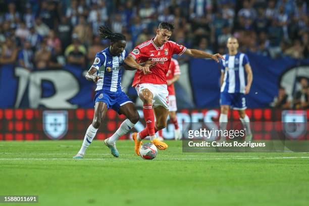 Romario Baro of FC Porto vies with Petar Musa of SL Benfica for the ball possession during the match between SL Benfica and FC Porto for the...