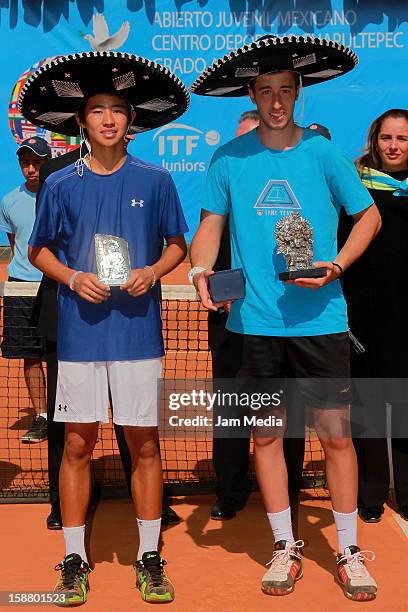 Naoki Nakawaga of Japon and Nikola Milojevic of Serbia during the Mexican Youth Tennis Open at Deportivo Chapultepec on December 29, 2012 in Mexico...