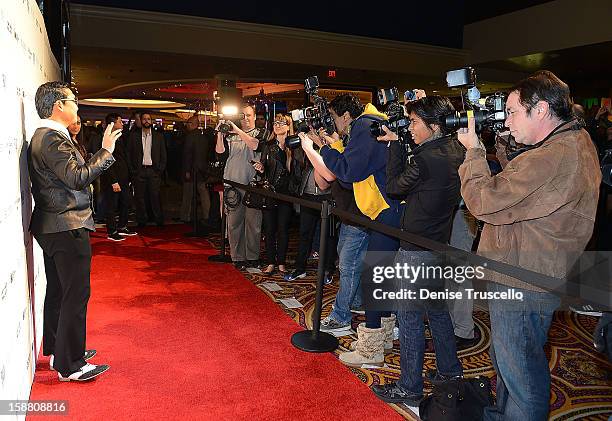 Psy arrives at the New Year's Eve kick off party "Gangnam Style" with a performance at PURE Nightclub on December 29, 2012 in Las Vegas, Nevada.