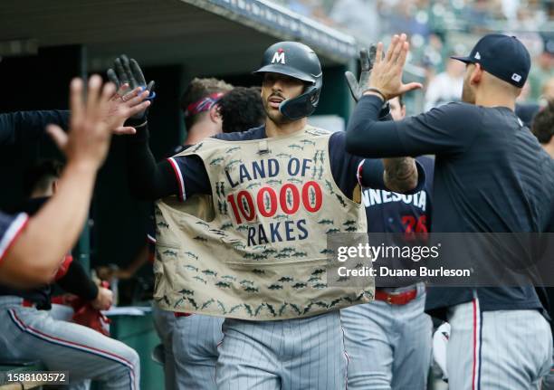 Carlos Correa of the Minnesota Twins celebrates after hitting a solo home run against the Detroit Tigers during the second inning at Comerica Park on...