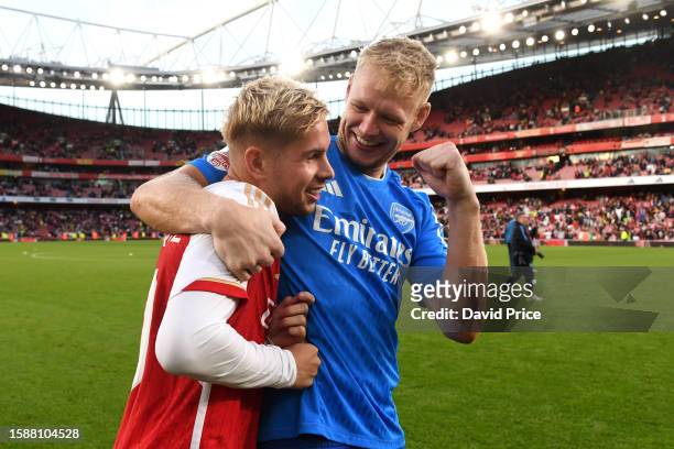 Emile Smith Rowe and Aaron Ramsdale of Arsenal celebrate after the team's victory in the pre-season friendly match between Arsenal FC and AS Monaco...