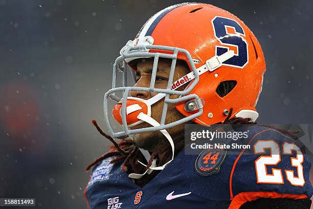 Prince-Tyson Gulley of the Syracuse Orange looks on during the game against the West Virginia Mountaineers during the New Era Pinstripe Bowl at...