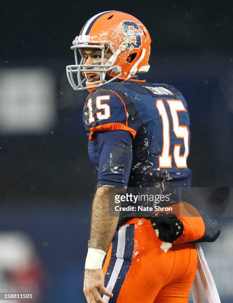 Alec Lemon of the Syracuse Orange looks on during the game against the West Virginia Mountaineers during the New Era Pinstripe Bowl at Yankee Stadium...