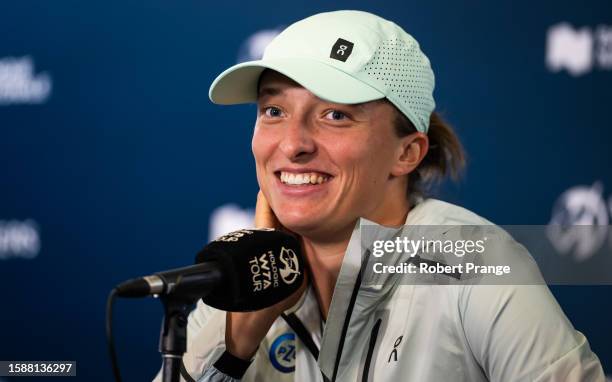 Iga Swiatek of Poland talks to the media after defeating Karolina Pliskova of the Czech Republic in the second round on Day 3 of the National Bank...