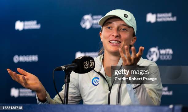 Iga Swiatek of Poland talks to the media after defeating Karolina Pliskova of the Czech Republic in the second round on Day 3 of the National Bank...