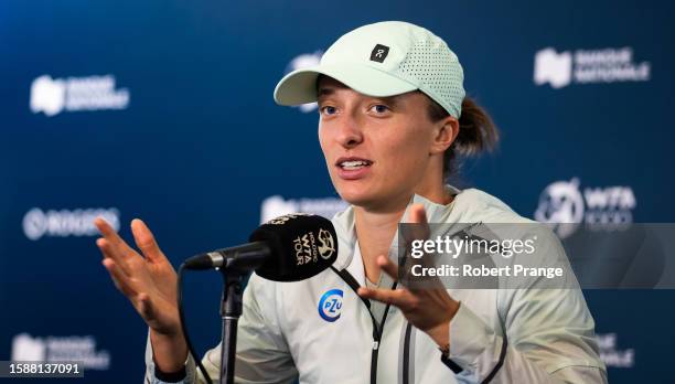 Iga Swiatek of Poland talks to the media after defeating Karolina Pliskova of the Czech Republic in the second round on Day 3 of the National Bank...