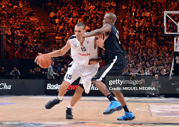 French All star player Rudy Gobert vies against a Foreign ProA All Star US player Jawad Williams during the France's national basketball league 2012...