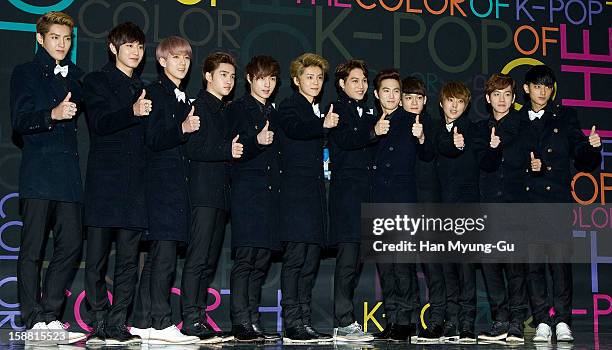 Members of boy band EXO-K and EXO-M arrive at the 2012 SBS Korea Pop Music Festival named 'The Color Of K-Pop' at Korea University on December 29,...