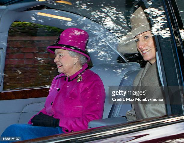 Queen Elizabeth II and Sophie,Countess of Wessex leave St. Mary Magdalene Church, Sandringham in Queen Elizabeth's Bentley car after attending Sunday...