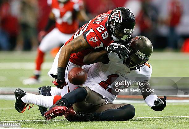 Dominique Franks of the Atlanta Falcons breaks up a pass intended for Sammie Stroughter of the Tampa Bay Buccaneers at Georgia Dome on December 30,...