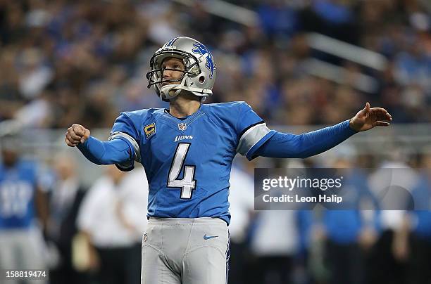 Jason Hanson of the Detroit Lions kicks an extra point during the third quarter of the game against the Chicago Bears at Ford Field on December 30,...