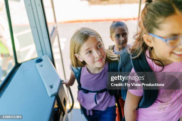 girls boarding school bus - busshållplats bildbanksfoton och bilder