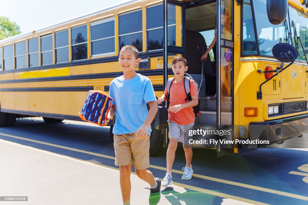 Got Off Tween Boys Getting Off School Bus High-Res Stock Photo - Getty Images