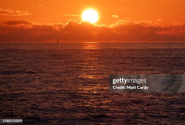 The sun sets over the sea at Sennen Cove on July 25, 2023 in Cornwall, England. The county of Cornwall, in the south west of England, remains one of...