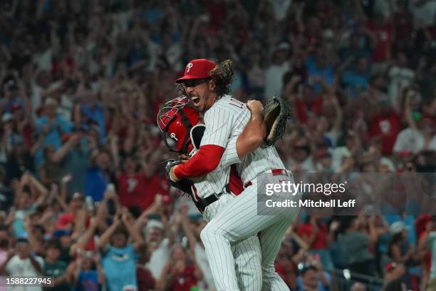 Michael Lorenzen of the Philadelphia Phillies celebrates with J.T. Realmuto after throwing a no-hitter against the Washington Nationals at Citizens...