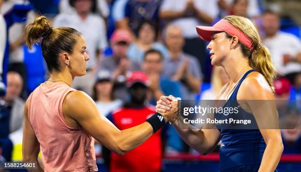 Maria Sakkari of Greece and Danielle Collins of the United States shake hands at the net after the second round on Day 3 of the National Bank Open...