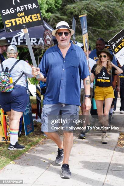 Alfred Molina walks the picket line in support of the SAG-AFTRA and WGA strike at Warner Brothers Studios on August 9, 2023 in Burbank, California.