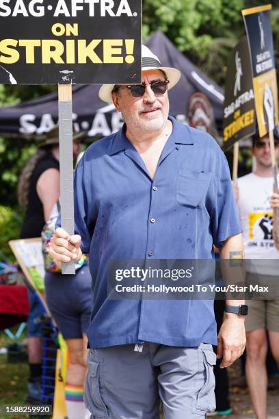 Alfred Molina walks the picket line in support of the SAG-AFTRA and WGA strike at Warner Brothers Studios on August 9, 2023 in Burbank, California.