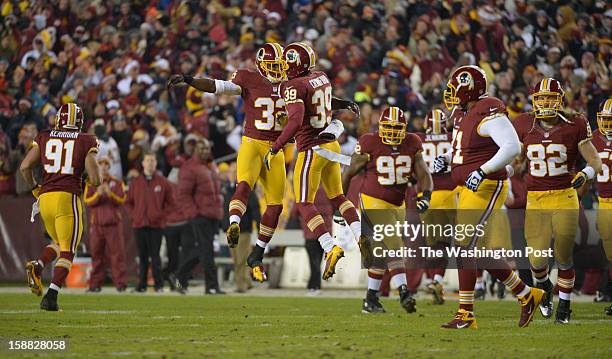 December 30: Washington Redskins defensive back Jordan Pugh and Washington Redskins cornerback Richard Crawford celebrate after Crawford's...