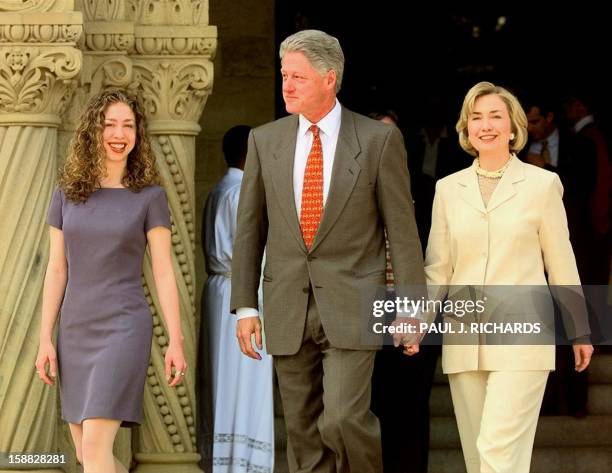 President Bill Clinton , First Lady Hillary Rodham Clinton , and their daughter Chelsea , leave Stanford Memorial Church 03 May at Stanford...