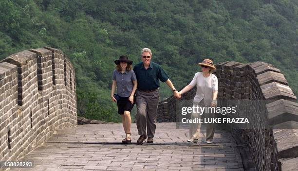 President Bill Clinton, first lady Hillary Clinton and their daugther Chelsea tour the The Great Wall of China at Mutianyu 28 June. Clinton is...