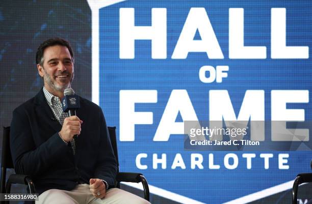 Jimmie Johnson speaks with the media after receiving the votes to be inducted during the NASCAR Hall of Fame Voting Day at NASCAR Hall of Fame on...