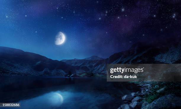 night shot of lake - mountain range night stock pictures, royalty-free photos & images