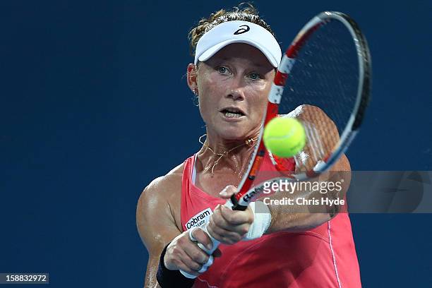 Sam Stosur of Australia plays a backhand in her match against Sofia Arvidsson of Sweden during day two of the Brisbane International at Pat Rafter...