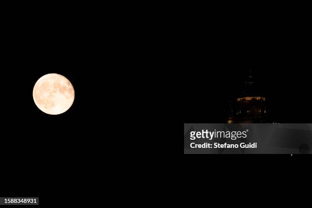The Sturgeon Super Moon is seen near of Basilica di Superga on August 2, 2023 in Turin, Italy. This is the first of two super moons in the month of...